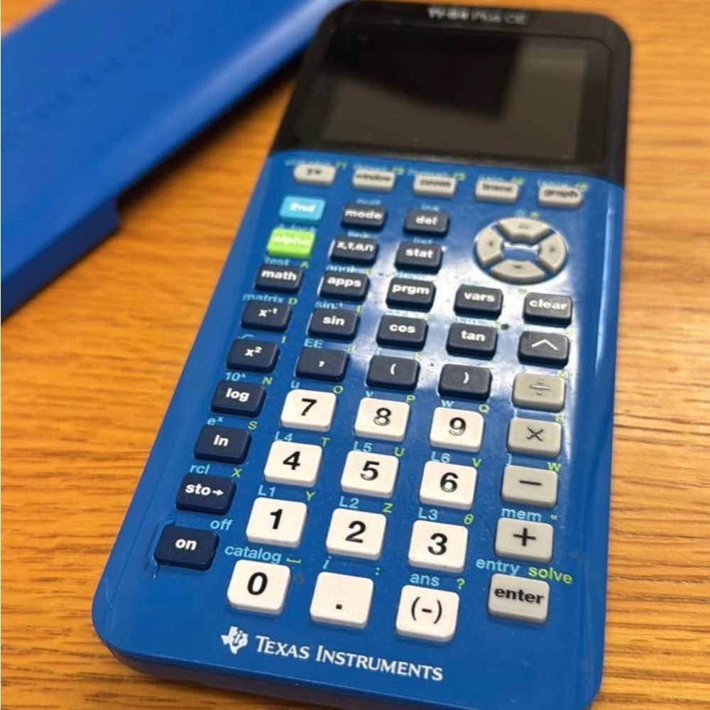 Texas Instruments Blue and Black Calculator T-I84 plus CE